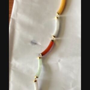 Multi colored jade bracelet with 14kt gold